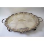 Large silver plated tray with scalloped border and handles with inscription dated 1914, 59cm width