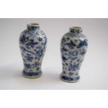 Pair of Chinese porcelain vases, the baluster body decorated with birds amongst foliage and