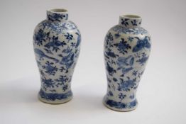 Pair of Chinese porcelain vases, the baluster body decorated with birds amongst foliage and