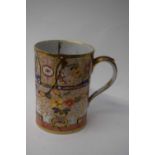 Large early 19th Century English porcelain tankard decorated in Imari style (a/f), 14cm high