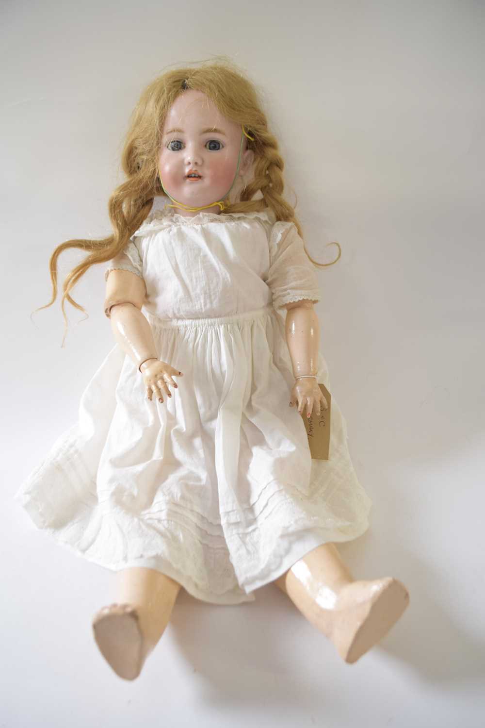 German bisque headed doll in original clothing, the head marked S&C, Germany