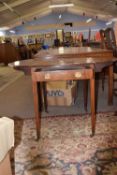Sheraton revival inlaid Pembroke table of oval form, single drawer, raised on tapering square