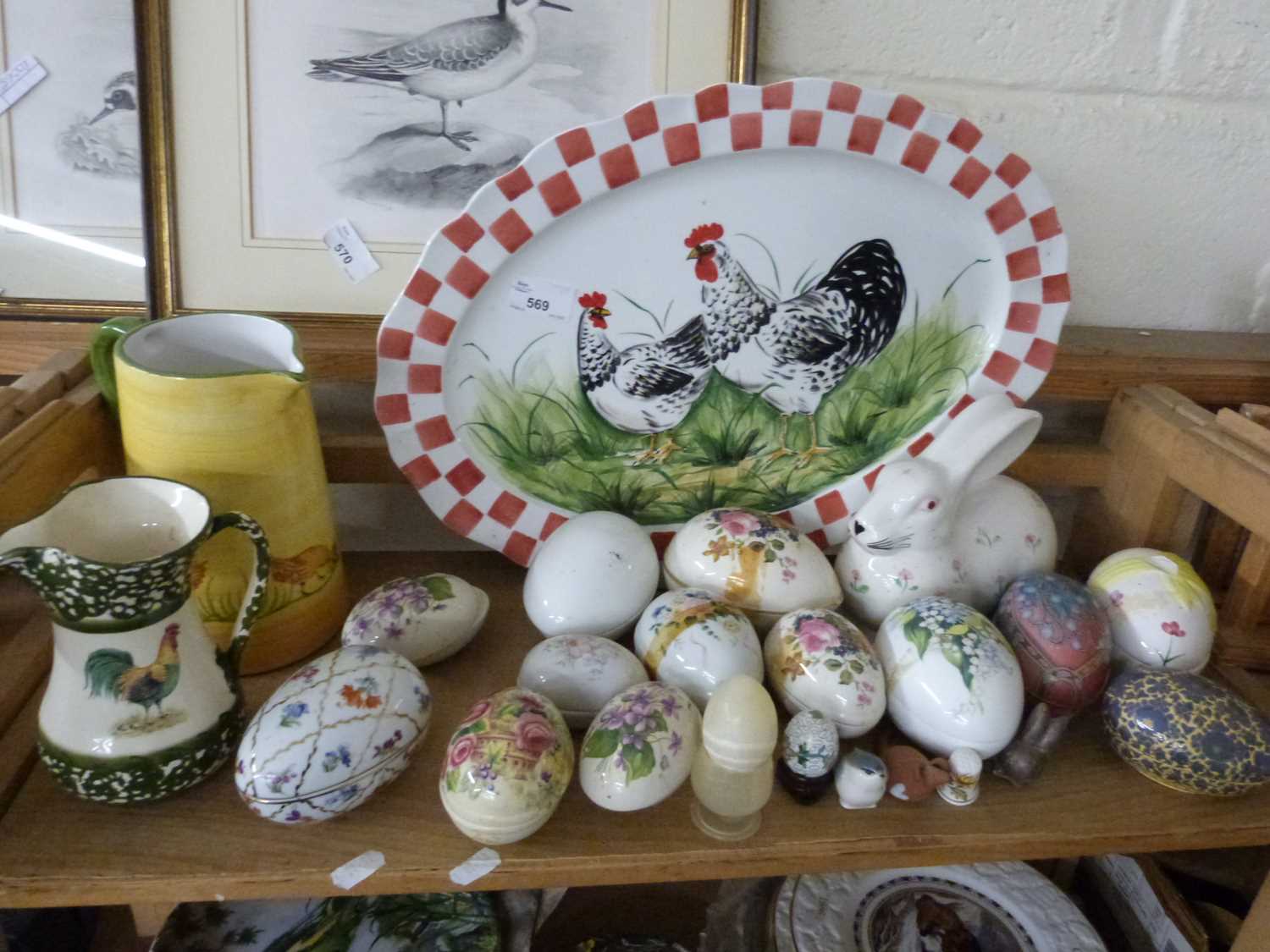 Collection of various ceramic eggs, meat plate decorated with chickens and other items