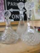 Three various assorted decanters