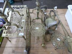 Collection of various brass fire tools, trivets and other items