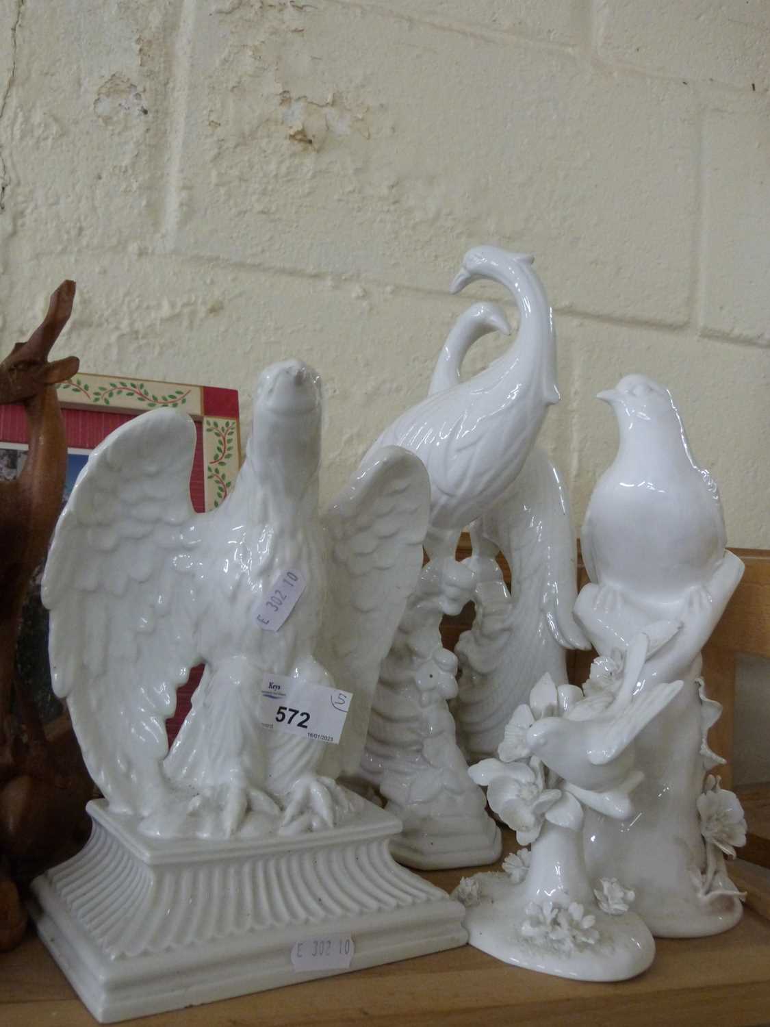 Collection of white porcelain model birds to include Crown Staffordshire