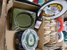 Box of various beer mats, pub ashtrays, bottle of Royal Wedding Ale etc