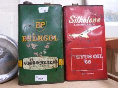 Two one gallon oil cans, BP and Silkoline