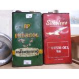 Two one gallon oil cans, BP and Silkoline