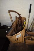 Box of assorted bow saws and other items