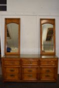 Modern light oak dresser cabinet with double mirrored back and a base with drawers, 168cm wide