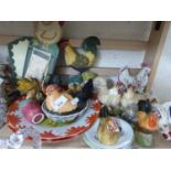 Collection of various model chickens, decorated plates and other items