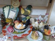 Collection of various model chickens, decorated plates and other items