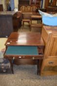Small mahogany writing table with single fitted drawer raised on tapering square legs, 57cm wide (