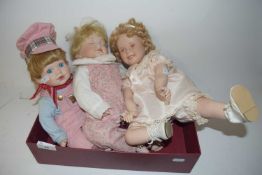 Three porcelain headed dolls