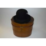 Vintage bowler hat and a metal hat box