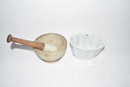 Pestle and mortar and a ceramic jelly mould