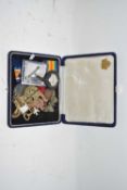 Box of mixed items to include military badges, nurses watch and various other items