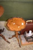 Reproduction walnut veneered wine table with tripod base