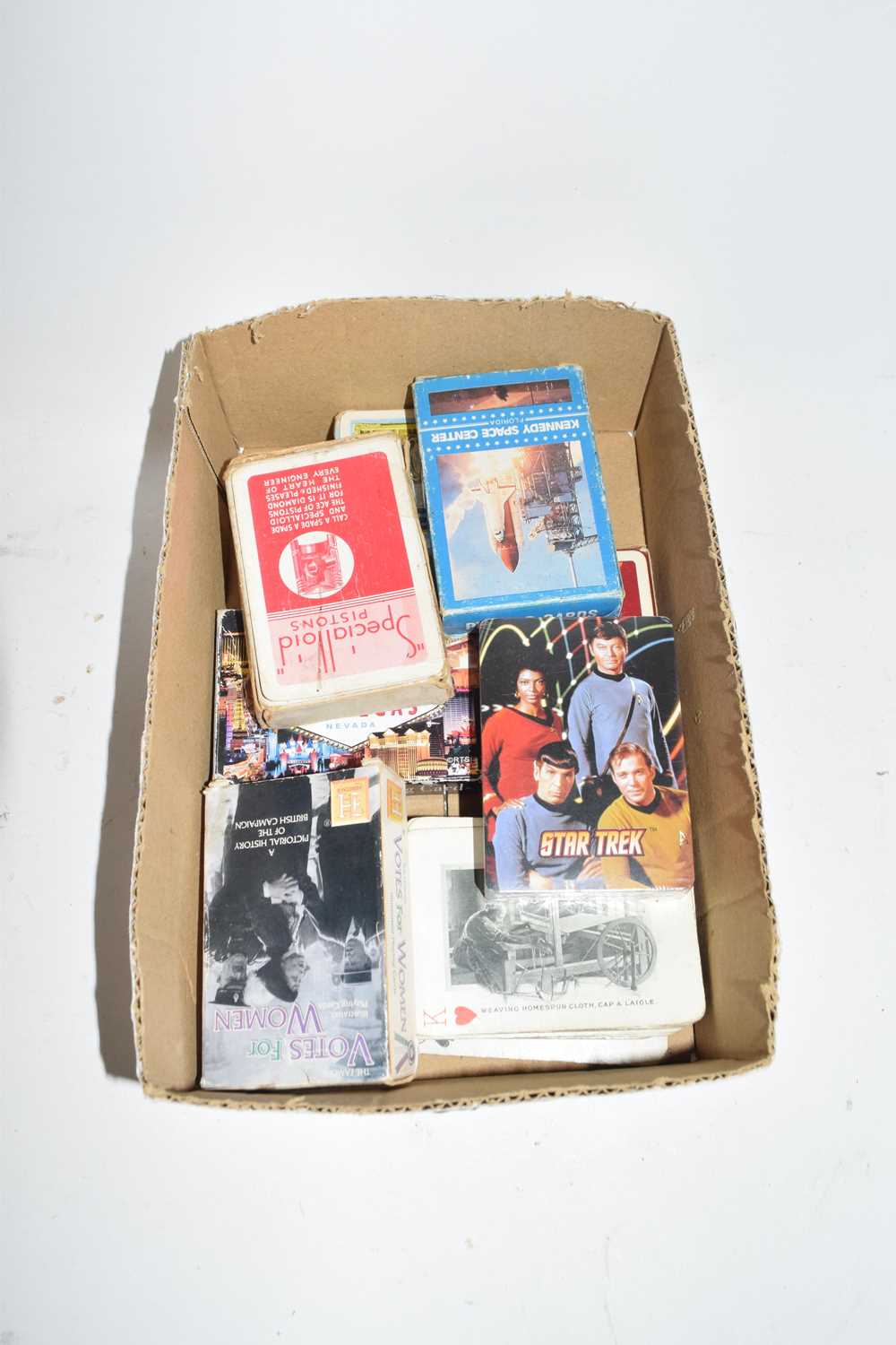 Box of assorted playing cards