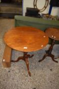 19th Century mahogany circular top table raised on a turned column with tripod base, top is 67cm
