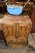 Small late Victorian two door, two drawer cabinet, formerly part of a larger piece