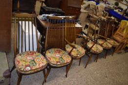 Set of six dark Ercol stick back dining chairs