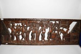 Large West African hardwood panel decorated with figures