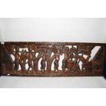 Large West African hardwood panel decorated with figures