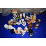 Collection of various novelty salt and pepper pots