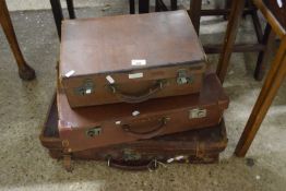 Three small vintage suitcases