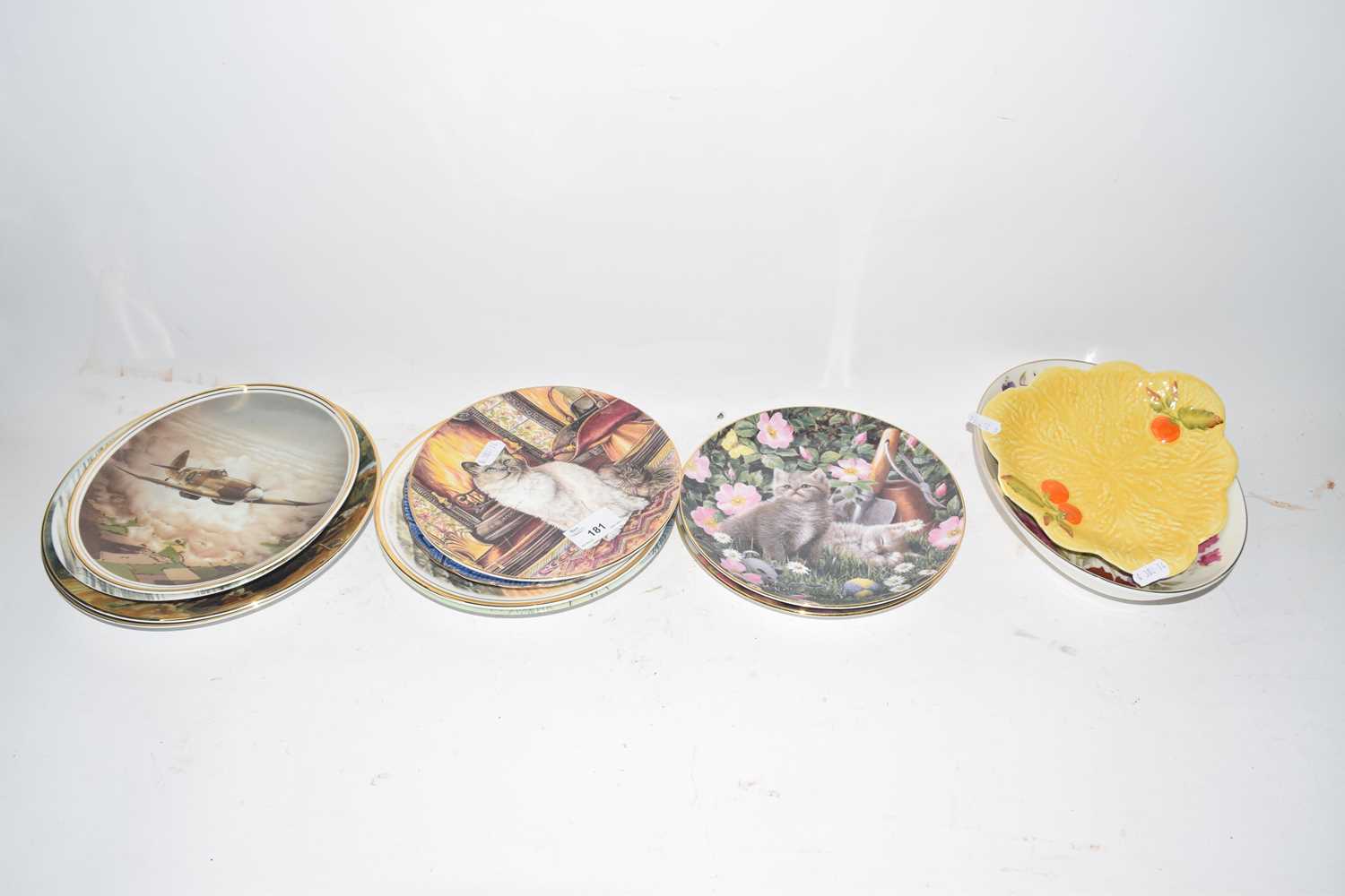 Collection of various decorative plates and bowls
