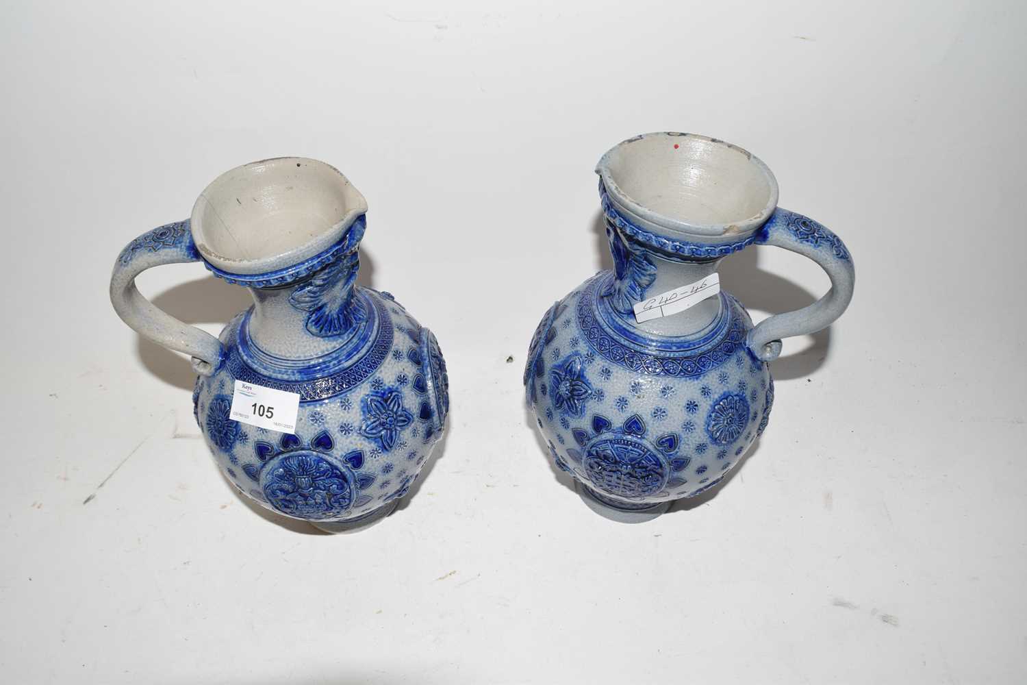 A pair of German stone ware jugs