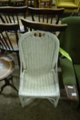 White painted wicker chair