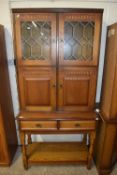 Modern oak veneered and lead glazed combination drinks cabinet and sideboard