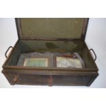 Vintage military trunk containing assorted pictures