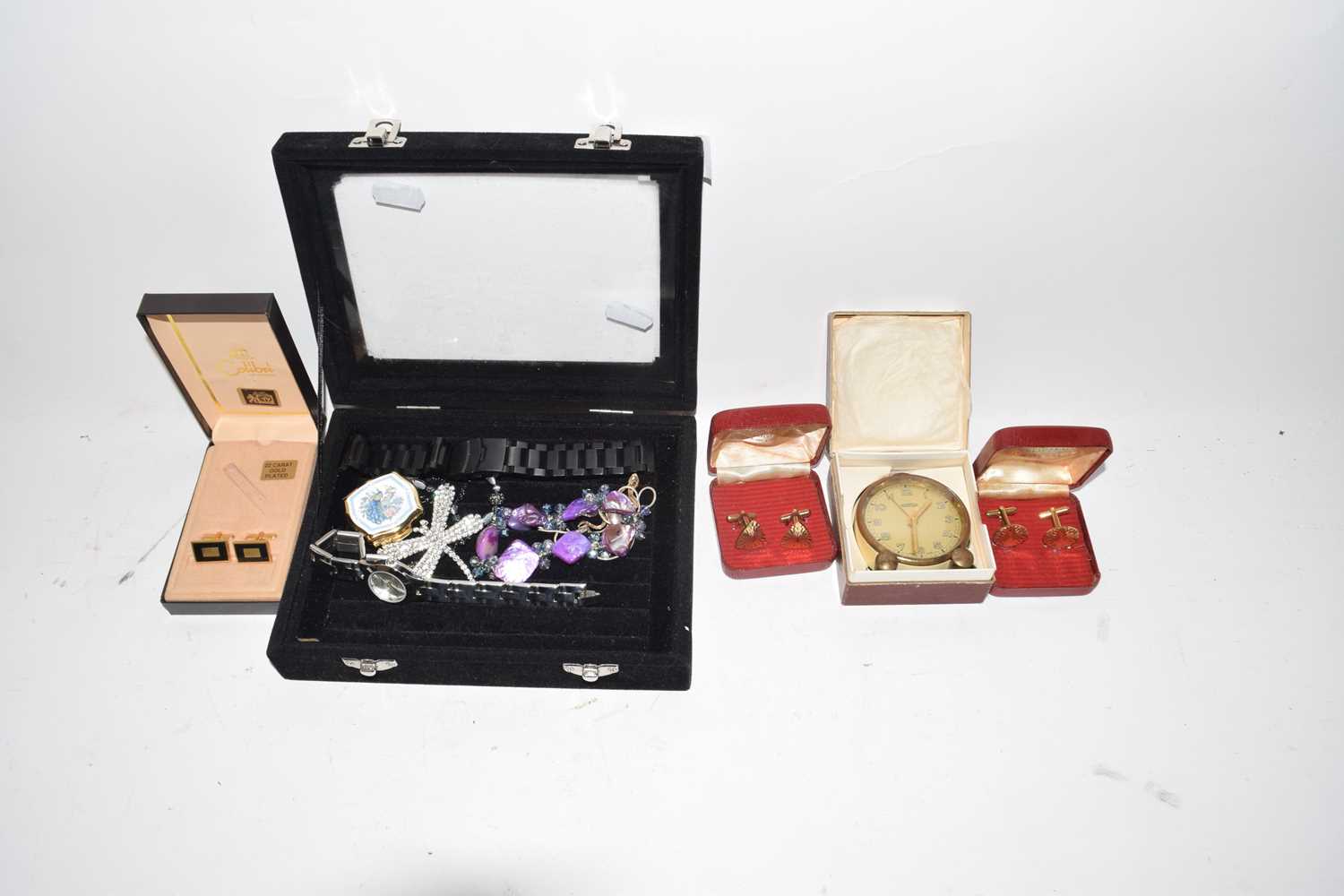 Collection of various costume jewellery, cufflinks, a Roamer bedside clock and other items