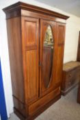 Edwardian wardrobe with oval mirrored door