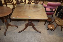 19th Century mahogany supper table with rectangular top over a turned column and tripod base