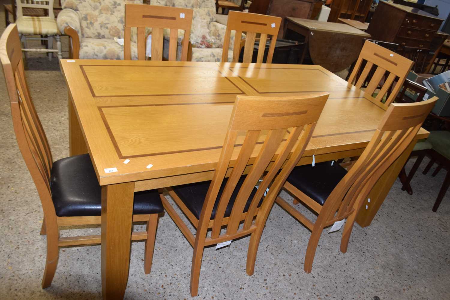 Modern light oak dining table and six chairs