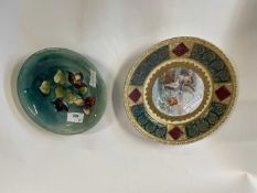 Small Moorcroft dish, mid 20th Century, the green ground with decoration of Freesias (chip to rim)