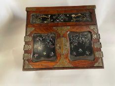 Early 20th Century Oriental table top box with two panelled doors opening to an interior with six