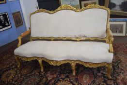 Large gilt wood framed sofa with triple arched back and serpentine front, 200cm wide