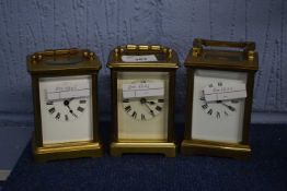 A group of three late 19th or early 20th Century carriage clocks, one with French movement, all with