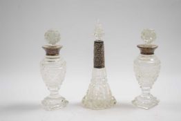 Group of condiment sets, cut glass with silver collars, early 20th Century (3)