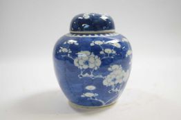 Further 19th Century Chinese porcelain ginger jar and cover, the blue ground with prunus decoration