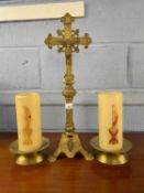 20th Century cast brass crucifix together with a pair of candle holders, largest piece 53cm high (