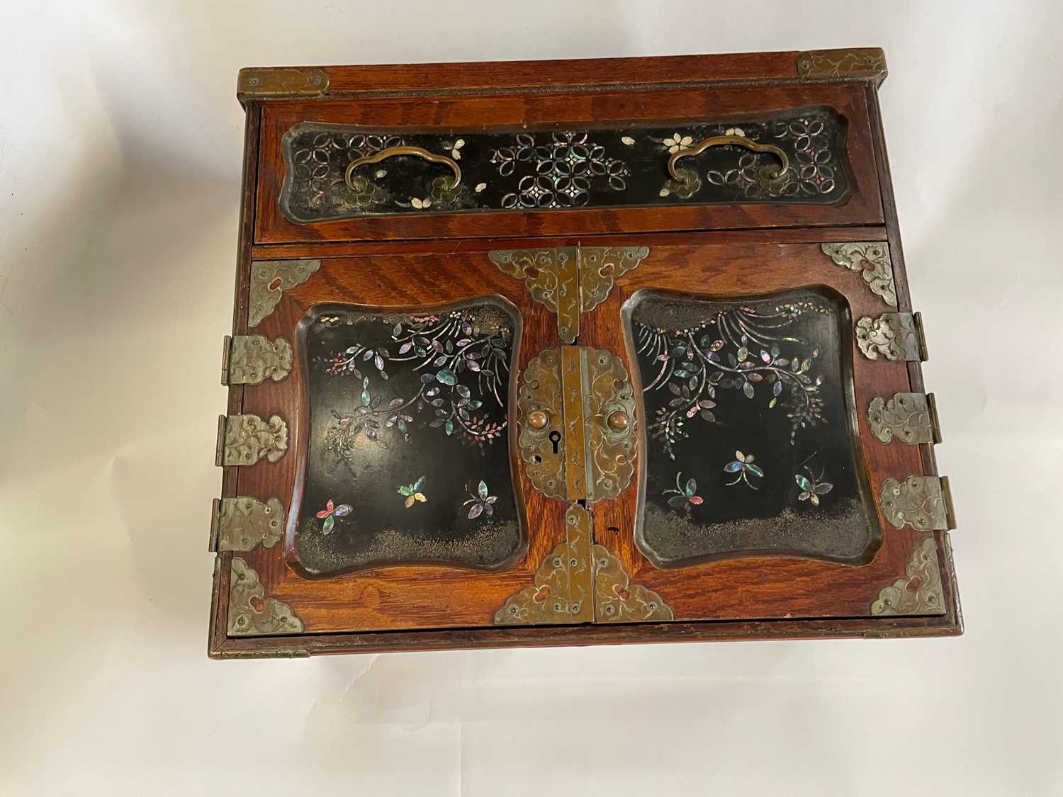 Early 20th Century Oriental table top box with two panelled doors opening to an interior with six - Image 2 of 4