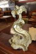 19th Century brass door stop in the form of a classical dolphin, 34cm high