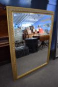 Large 20th Century rectangular bevelled wall mirror in gilt finish frame, 106 x 137 cm